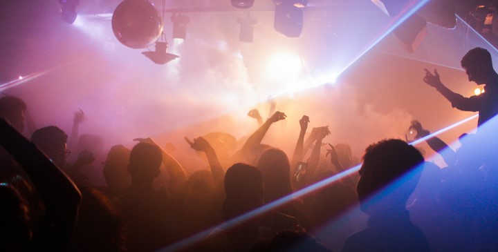 Image of young people enjoying themselves in a night club