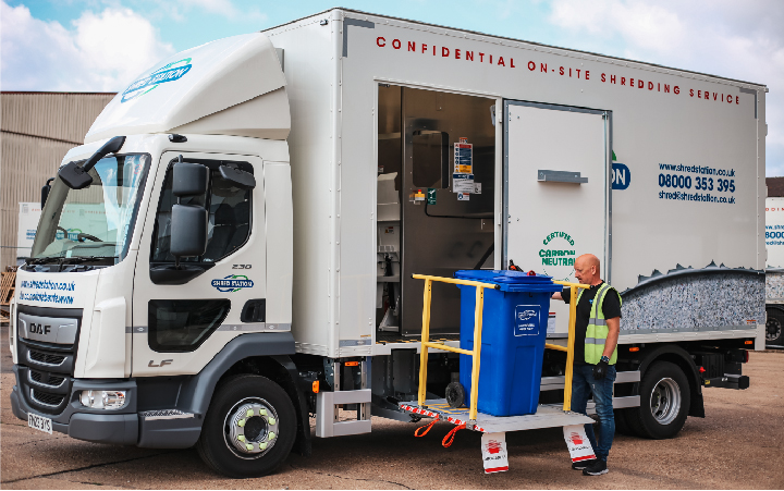 Image of Shred Station branded industrial shredder truck