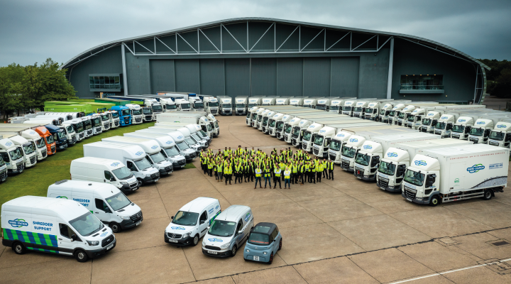 Photograph of Shred Station's workforce and fleet